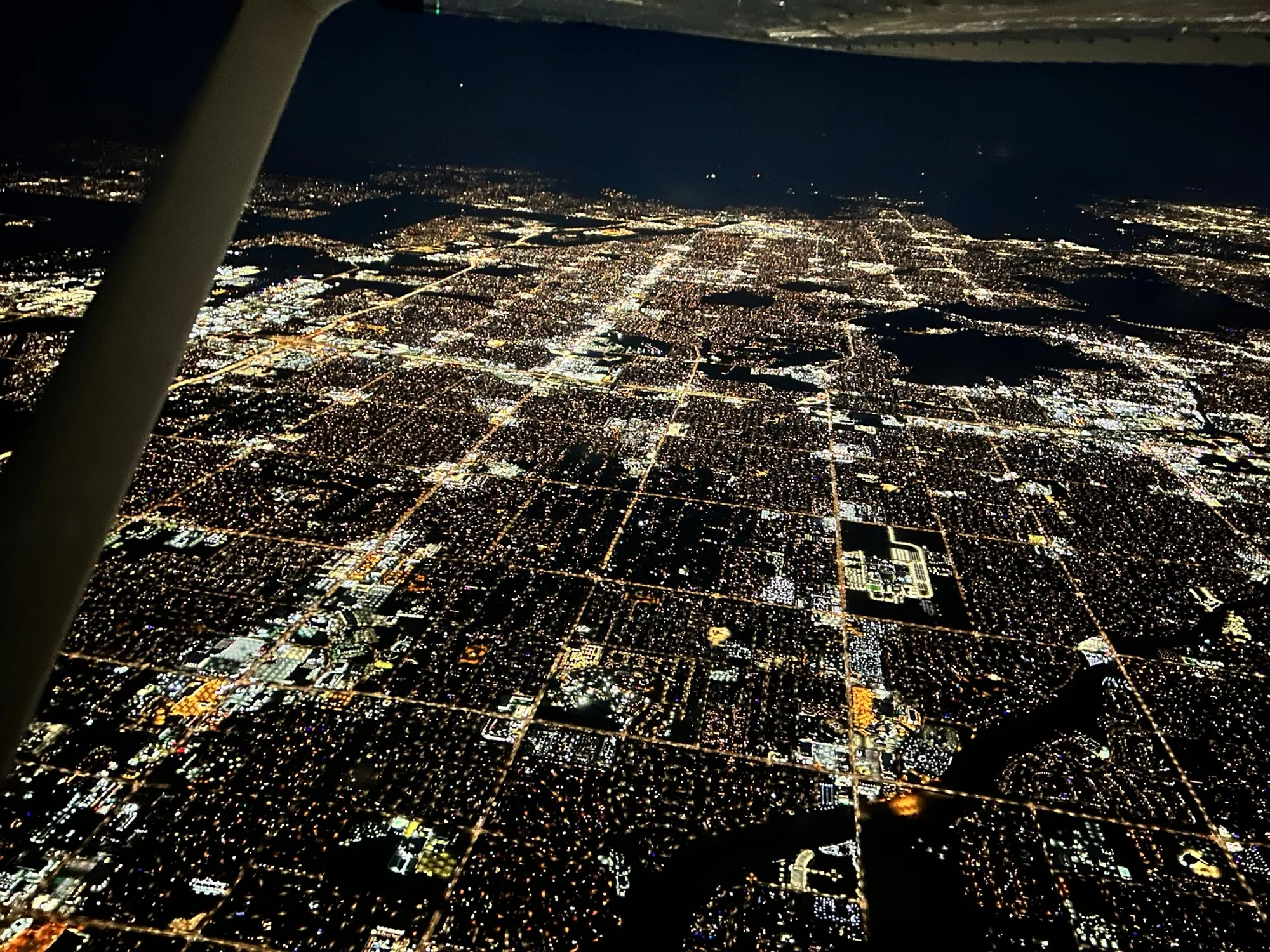 City lights at night from a light aircraft