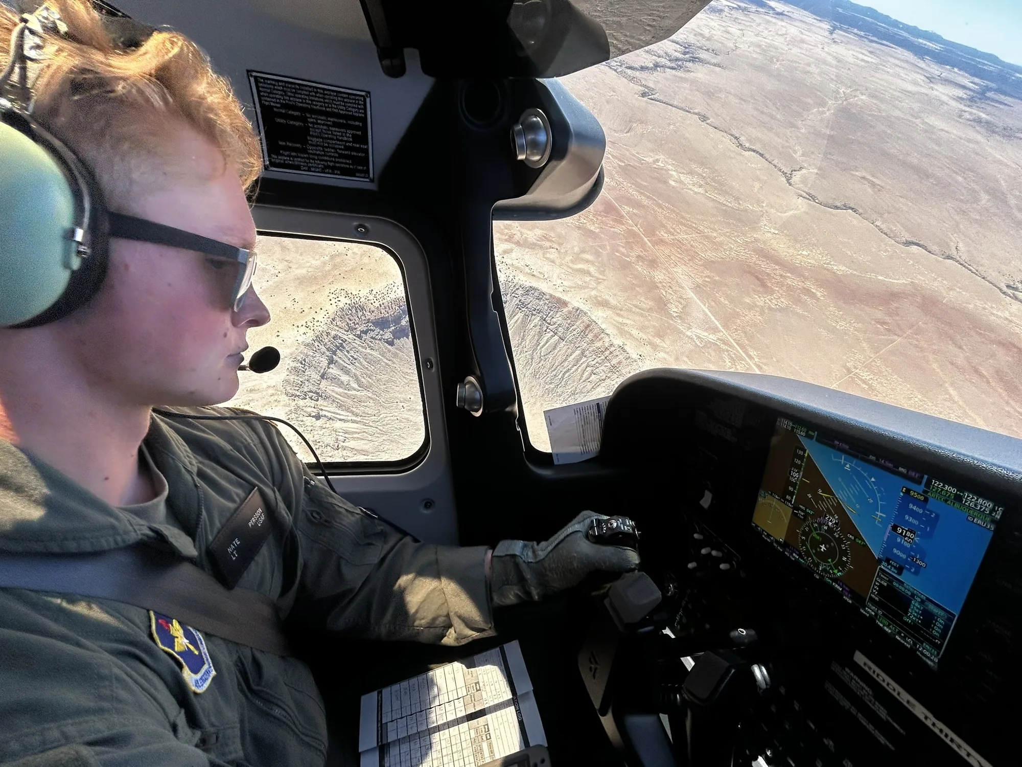 Flight student flying over Arizona terrain